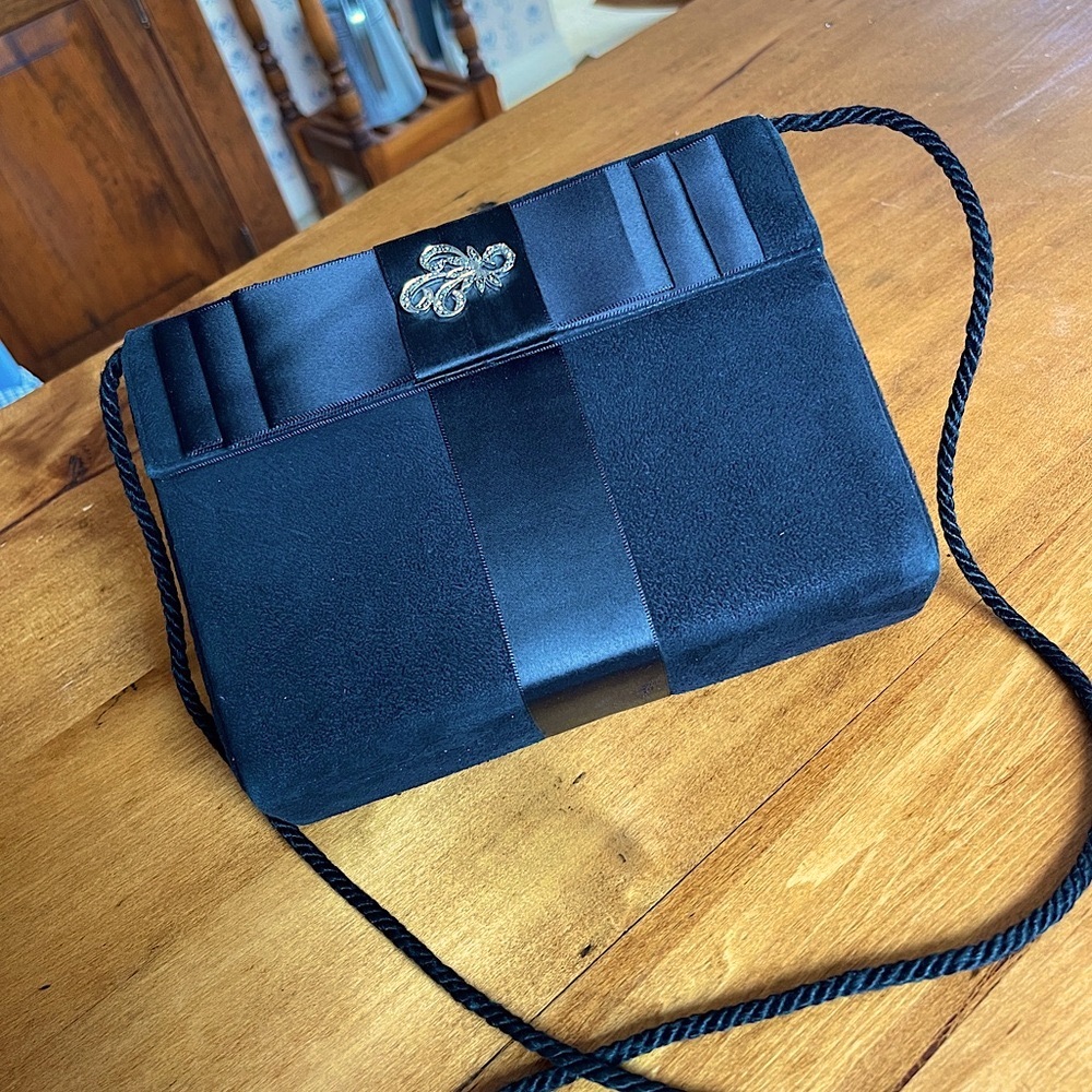 Vintage 1980s black suede purse with satin bow in mint condition